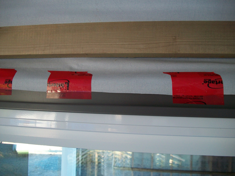 Window flashing with Typar skip taped to allow H2O to move down and out.