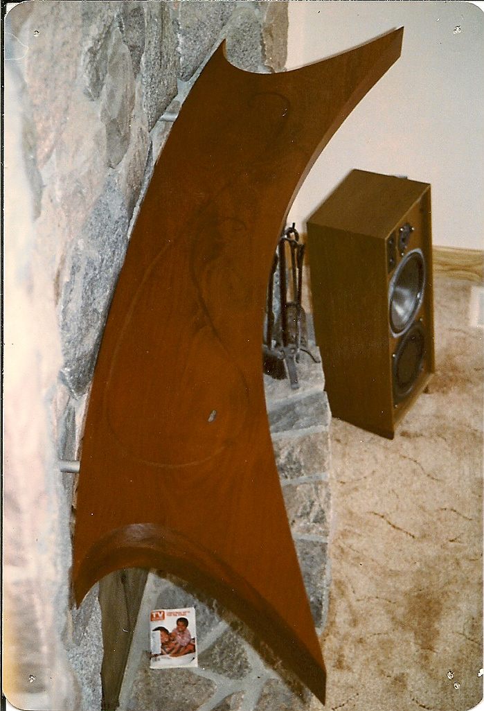 19' granite fireplace with 24"x4" mahogany whale mantle {notice the mother of pearl eye}