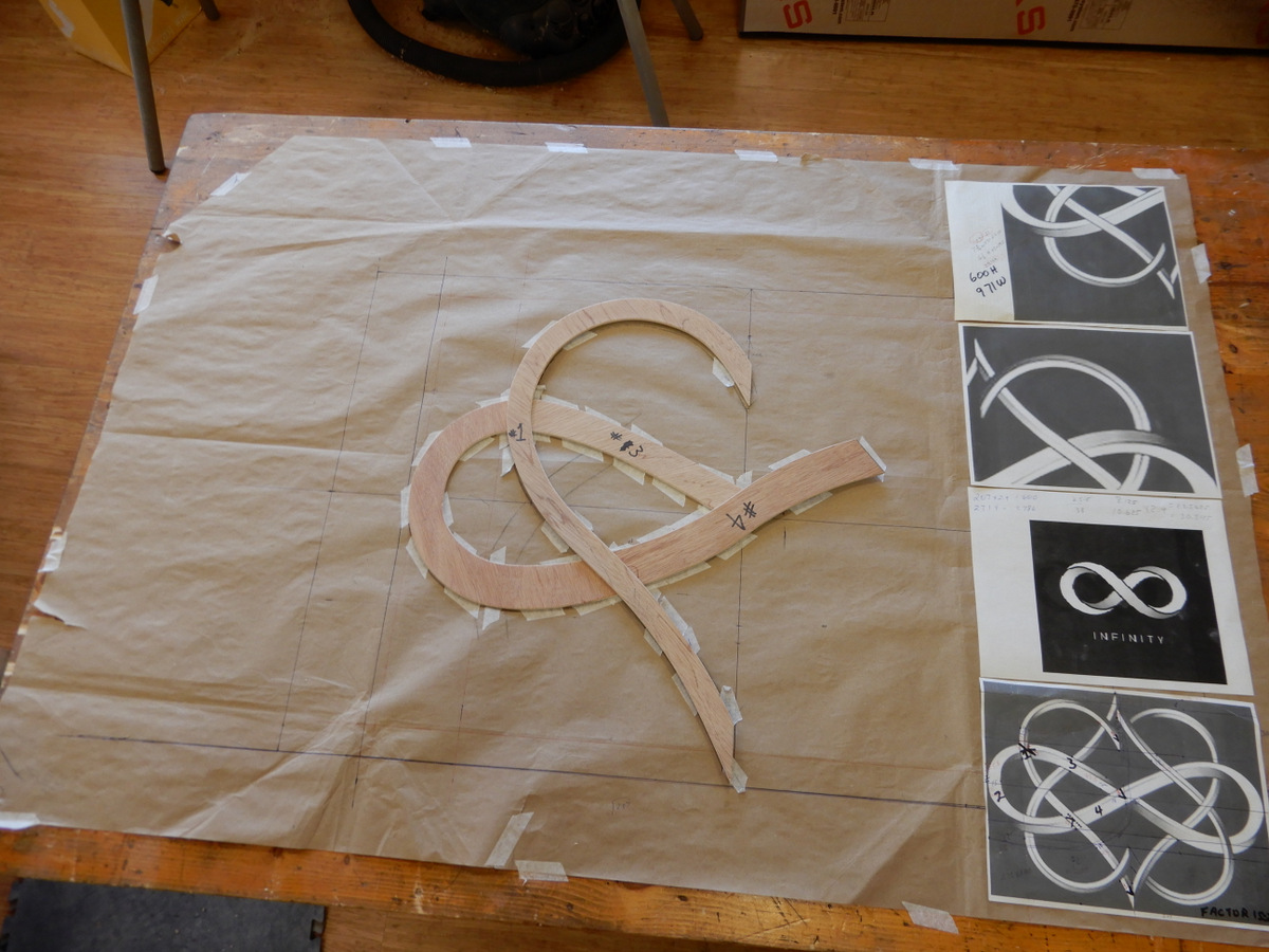 Full size templet layout, using old packaging paper with some office, laser printed patterns for guidance. Right angle register lines for accuracy. Yet, alas, it still got away from me. hahaha